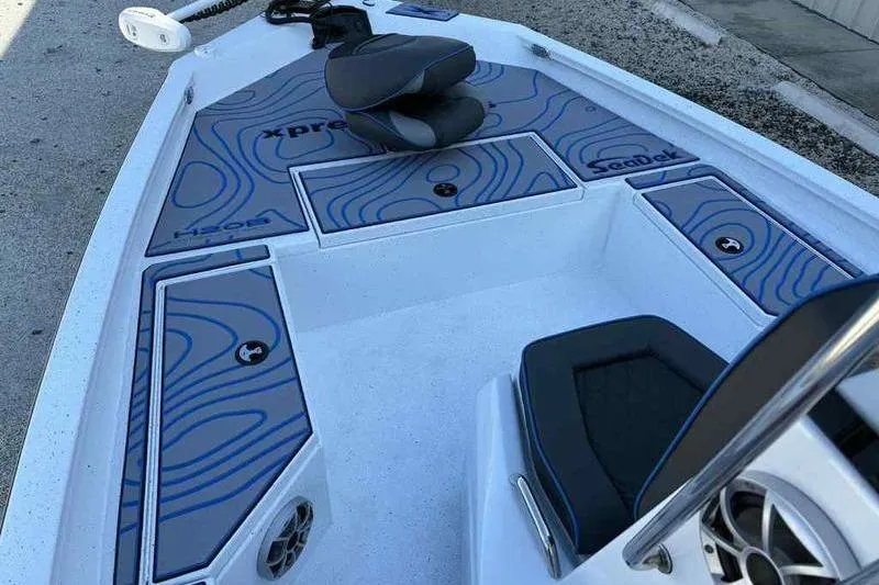Slide: The Image of 2026 Xpress H20B Bay boat interior with stylish seating and storage compartments. - 16