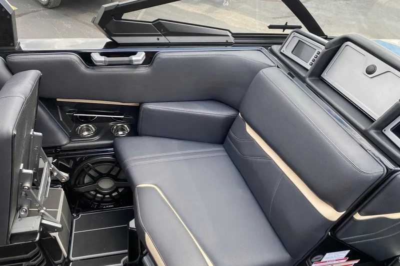 Slide: The Image of 2023 Supra SE450 interior with luxurious seating and modern design elements. - 10