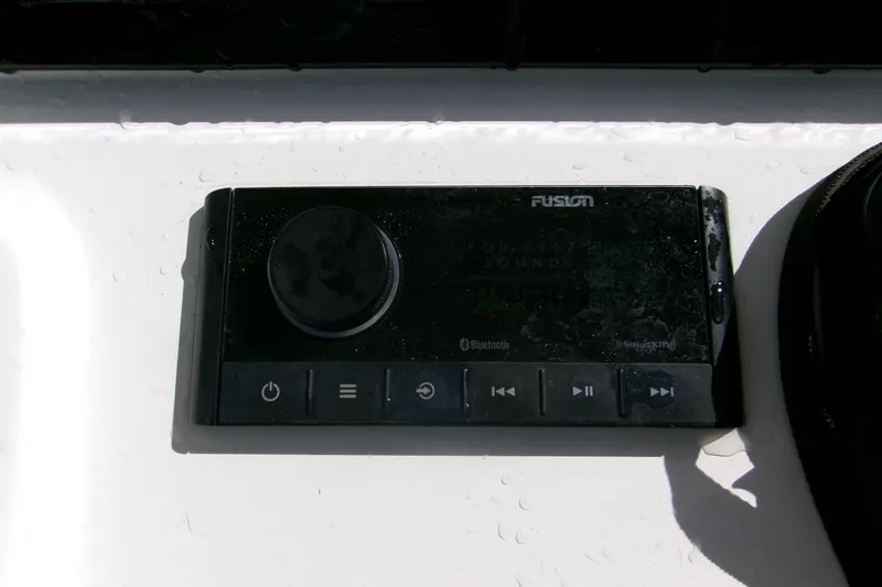 Slide: The Image of Fusion audio control panel on 2024 Sportsman Masters 227 Bay Boat. - 15