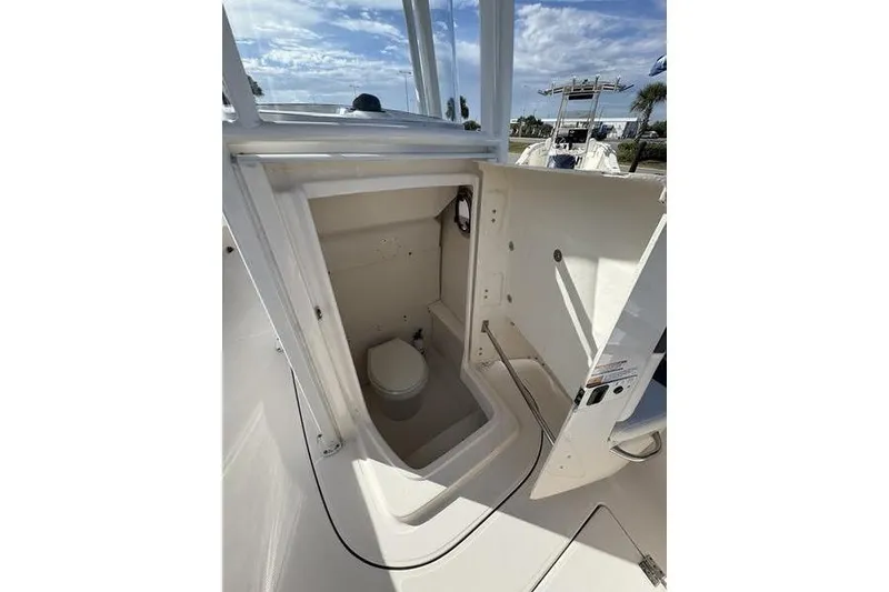 Slide: The Image of Minn Kota Terrova trolling motor on 2022 Robalo R242 Center Console boat. - 28