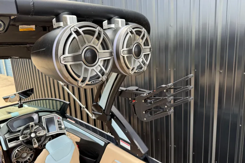 Slide: The Image of 2022 MasterCraft X24 boat with JL Audio speakers and sleek interior design. - 14