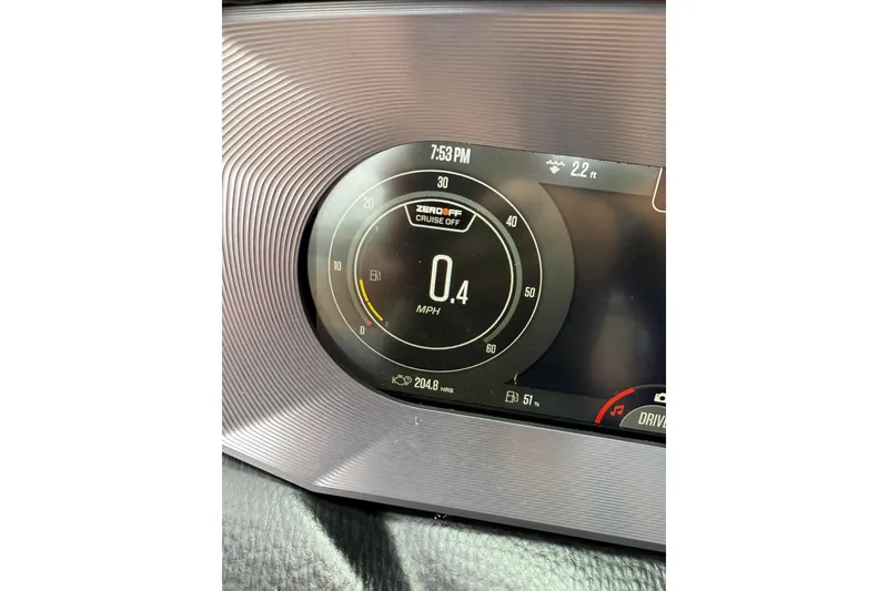 Slide: The Image of 2022 MasterCraft X24 dashboard display showing speed and fuel gauge. - 18