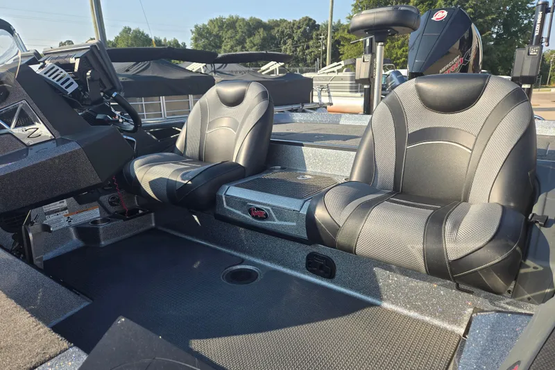 Slide: The Image of 2020 Ranger Z521L boat interior with dual seats and control panel. - 12