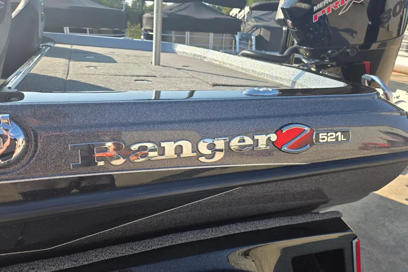 Slide: The Image of 2020 Ranger Z521L boat with metallic finish, featuring a Mercury Pro XS engine. - 13