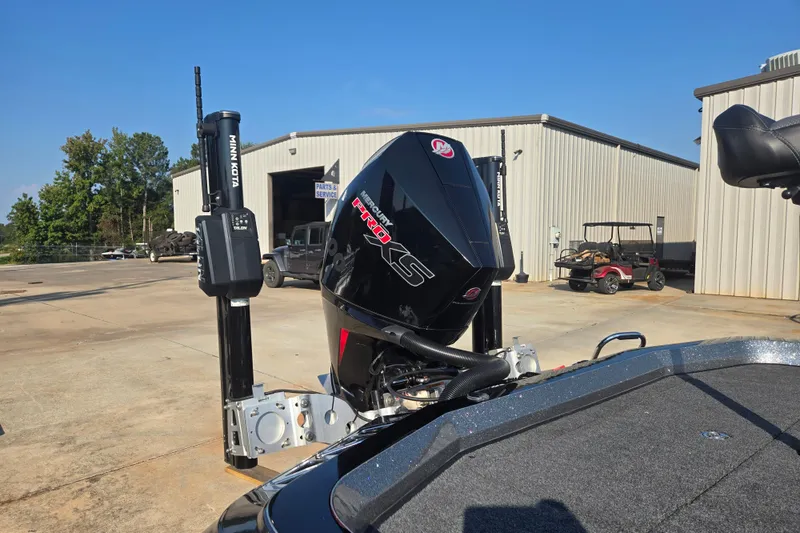 Slide: The Image of 2020 Ranger Z521L boat with Mercury Pro XS engine and Minn Kota Talon, outside service center. - 5