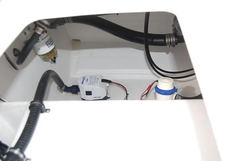 Slide: The Image of Interior view of TEXAR 16 boat engine compartment, showcasing hoses and components, 2026 model. - 11