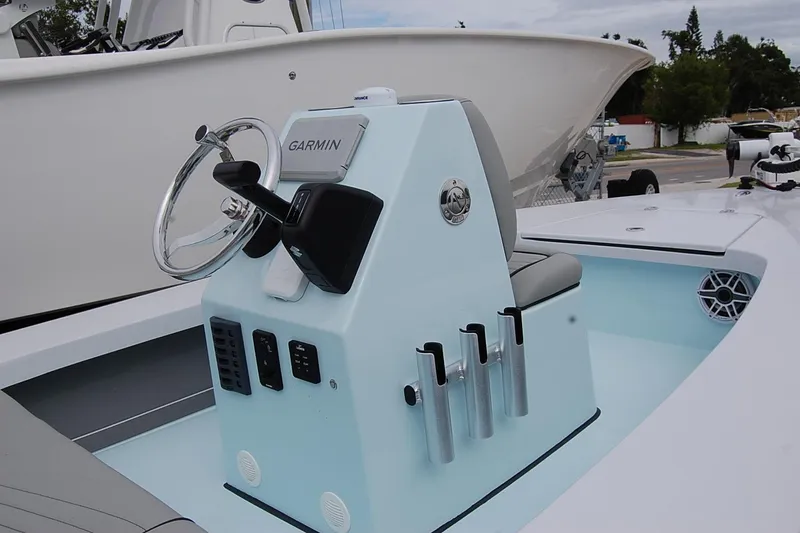 Slide: The Image of 2026 TEXAR 16 boat console with Garmin navigation system and sleek design. - 13