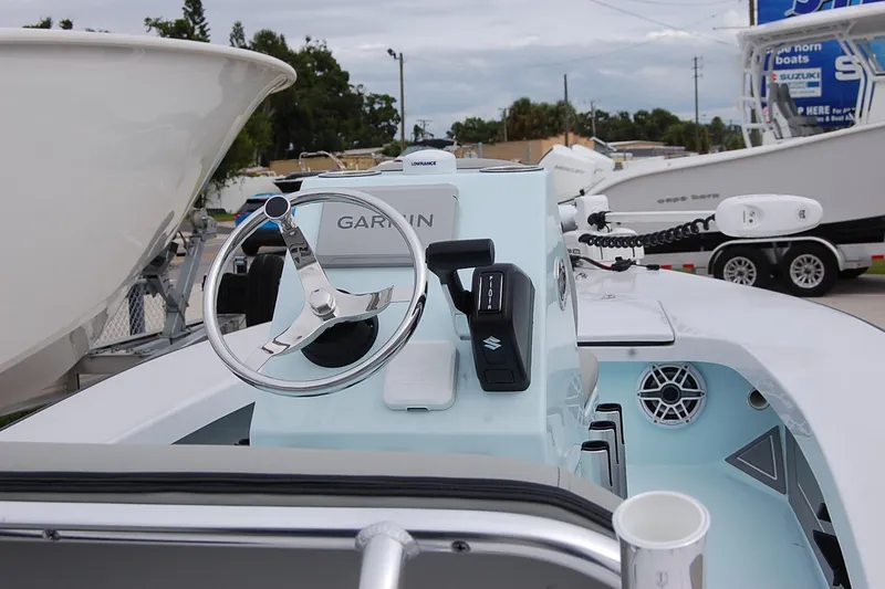 Slide: The Image of Steering console of a 2026 TEXAR 16 boat with Garmin navigation system. - 14