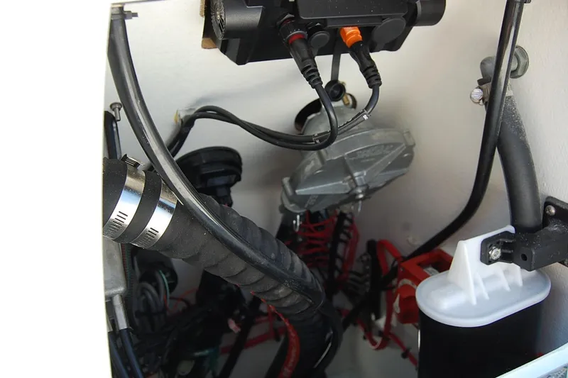 Slide: The Image of Interior view of TEXAR 16 engine components, showcasing wiring and mechanical parts, 2026 model. - 25