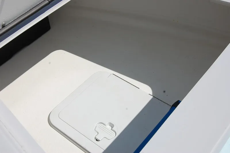 Slide: The Image of Open storage compartment in a 2026 TEXAR 16 boat. - 27