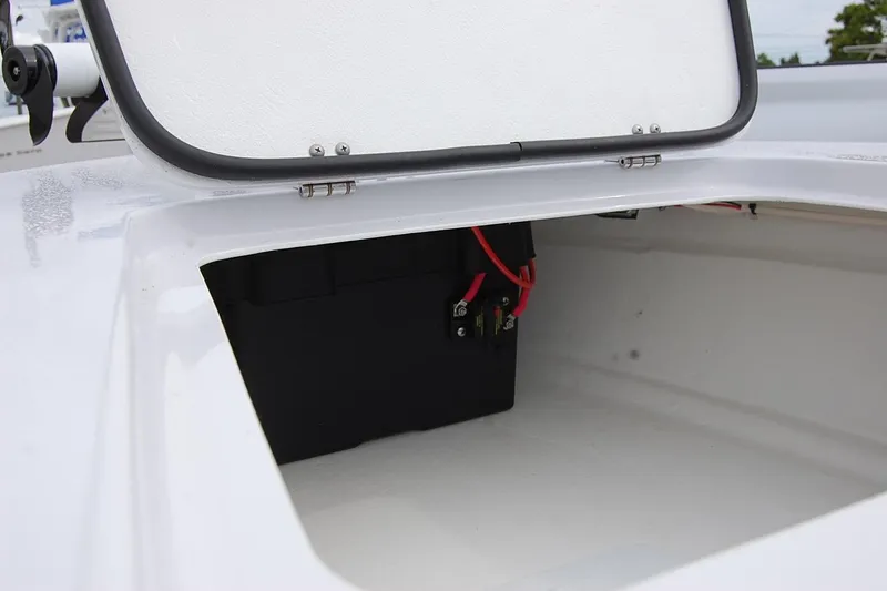 Slide: The Image of Open storage compartment in a 2026 TEXAR 16 boat, featuring electrical wiring. - 7