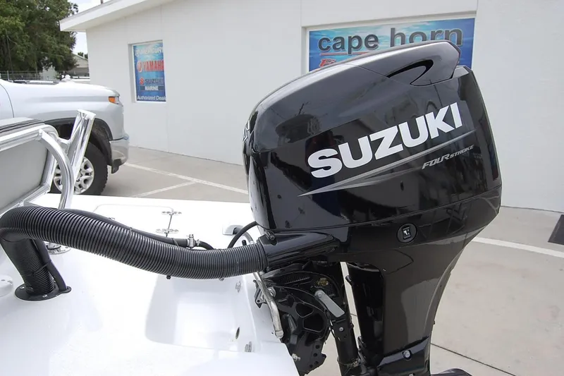 Slide: The Image of Black Suzuki four-stroke outboard motor on a TEXAR 16 boat, 2026 model. - 8