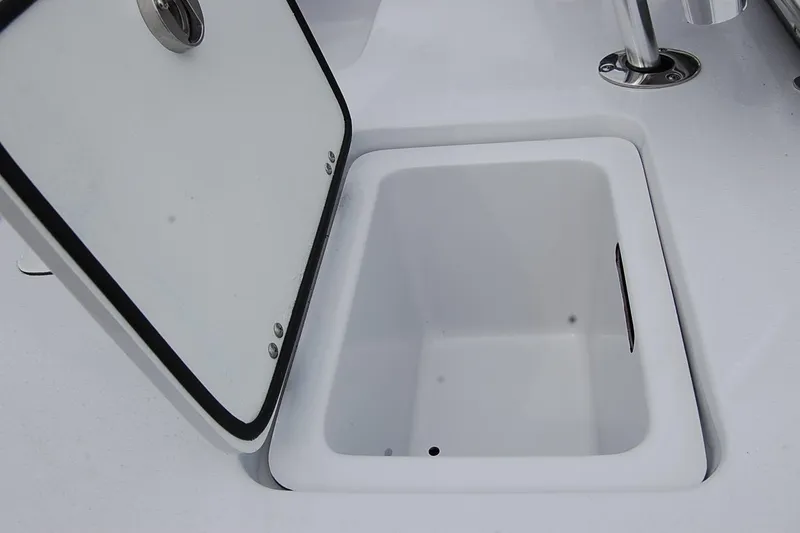 Slide: The Image of Open storage compartment on 2026 TEXAR 16 boat, featuring a sleek white design. - 9