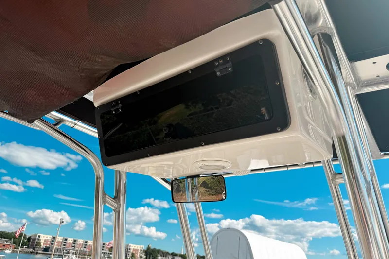 Slide: The Image of 2021 Key West 203 FS boat console with clear blue sky background. - 10
