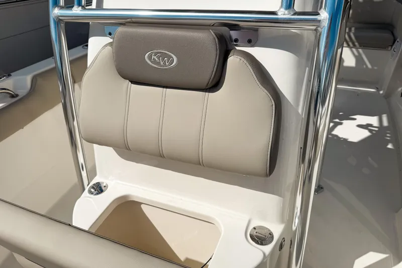 Slide: The Image of 2021 Key West 203 FS boat seat with KW logo and stainless steel frame. - 19