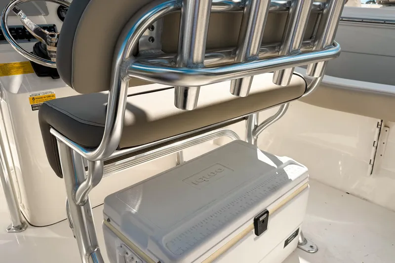 Slide: The Image of 2021 Key West 203 FS boat interior with seating and cooler storage. - 7