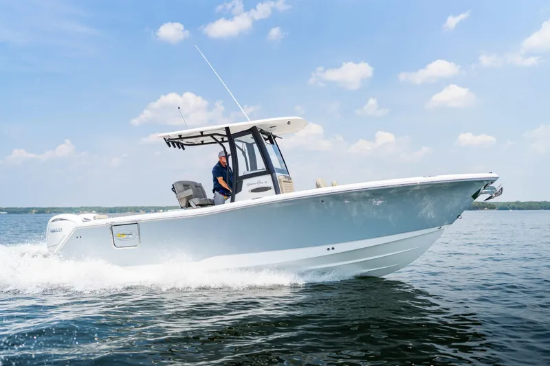 Slide: The Image of 2026 Sea Hunt Gamefish 25 cruising on a sunny day, showcasing sleek design and performance. - 20