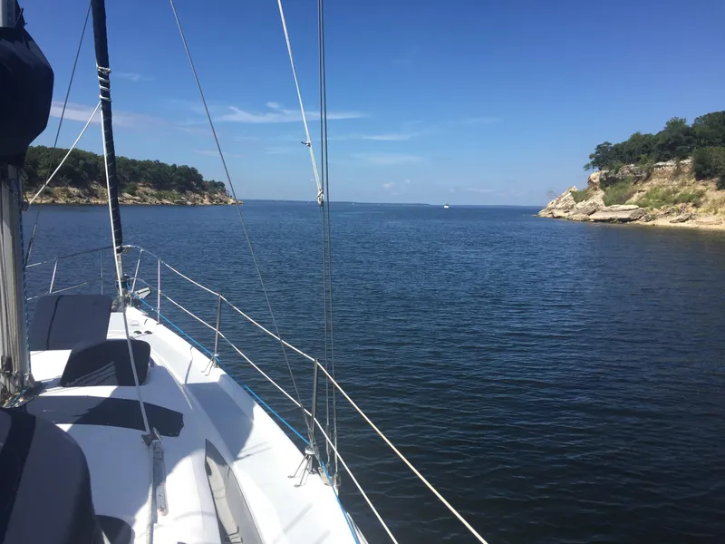 Slide: The Image of Cockpit of a 1997 Hunter 376 sailboat with ropes and winches. - 12