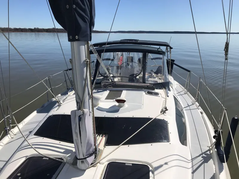 Slide: The Image of Cockpit of 1997 Hunter 376 sailboat with ropes and winches. - 13