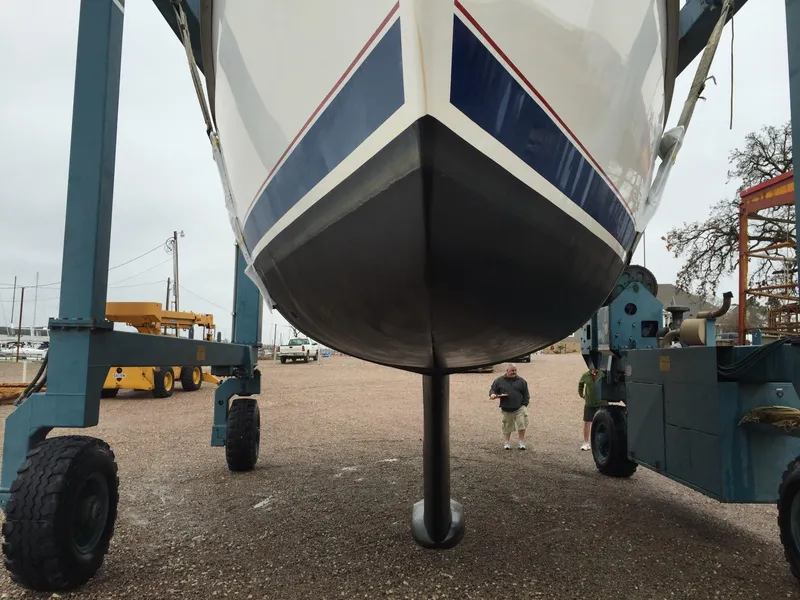 Slide: The Image of Hunter 376 sailboat from 1997 on a Marine Travelift, ready for launch. - 16