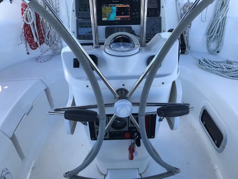 Slide: The Image of Luxurious 1997 Hunter 376 yacht interior with modern kitchen and cozy seating area. - 20