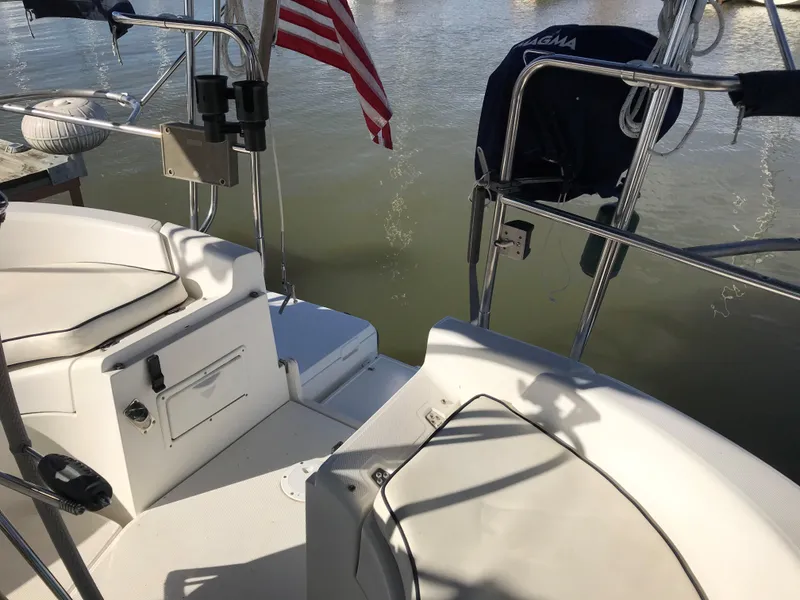 Slide: The Image of Interior of a 1997 Hunter 376 sailboat with cozy seating and modern amenities. - 29