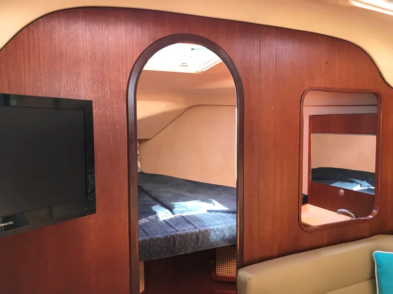 Slide: The Image of Compact kitchen in 1997 Hunter 376 sailboat with stove and microwave. - 39