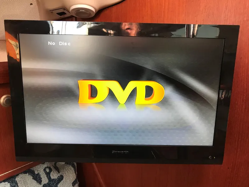 Slide: The Image of Engine compartment of a 1997 Hunter 376 sailboat, showcasing mechanical components. - 46