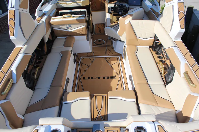 Slide: The Image of 2026 Tigé Ultré 25ZX boat interior with luxurious seating and modern design. - 24