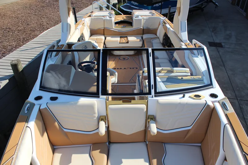Slide: The Image of 2026 Tigé Ultré 25ZX boat interior with luxurious seating and modern design. - 3