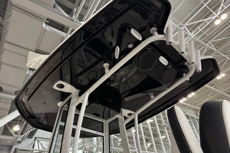 Slide: The Image of 2026 Tidewater 198 CC Adventure boat interior at an indoor exhibition. - 15