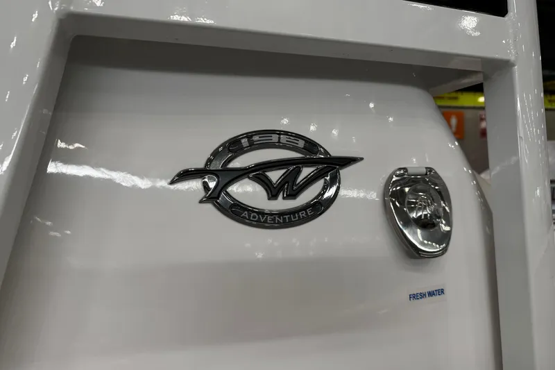 Slide: The Image of 2026 Tidewater 198 CC Adventure boat interior with Yamaha 150 engine in showroom. - 8