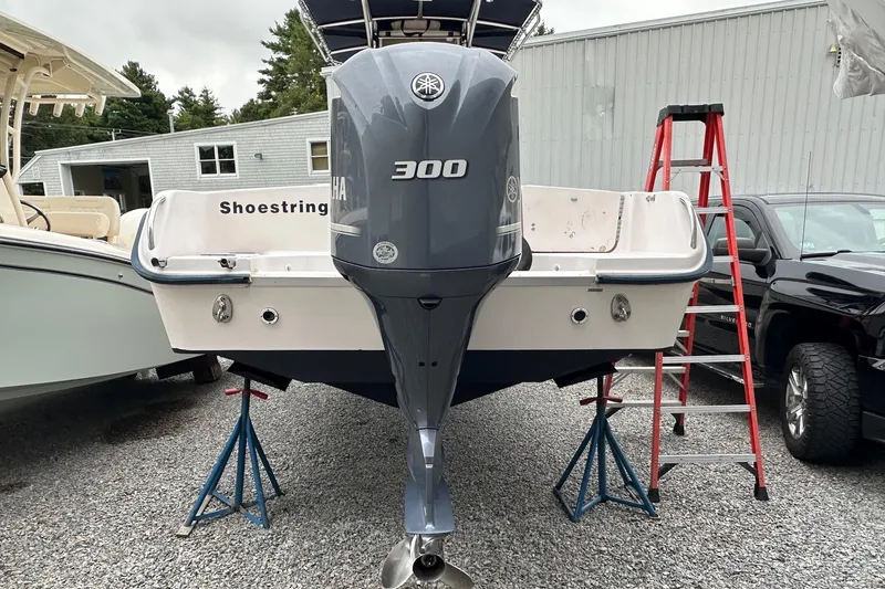 Slide: The Image of Grady-White Advance 247 boat, 2000 model, with Yamaha 300 engine on stands. - 2