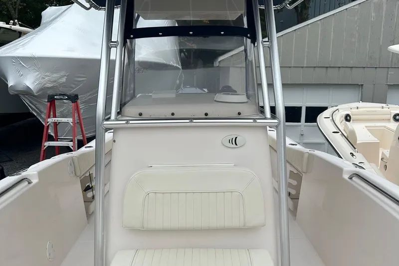 Slide: The Image of 2000 Grady-White Advance 247 boat interior with seating and console view. - 7