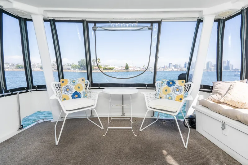 Slide: The Image of Interior of 1993 Carver 350 Aft Cabin Motor Yacht with waterfront view. - 26