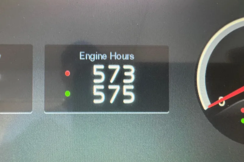 Slide: The Image of Engine hours display on 2019 Regal 42 Fly, showing 573 and 575 hours. - 25
