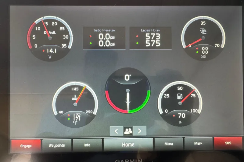 Slide: The Image of Dashboard display of a 2019 Regal 42 Fly boat showing engine metrics and gauges. - 26