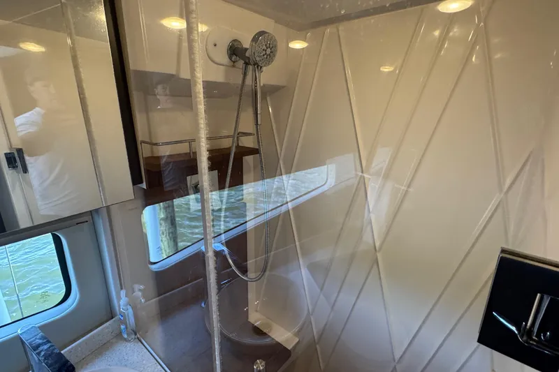 Slide: The Image of Luxurious bathroom interior of 2019 Regal 42 Fly yacht with modern shower design. - 31