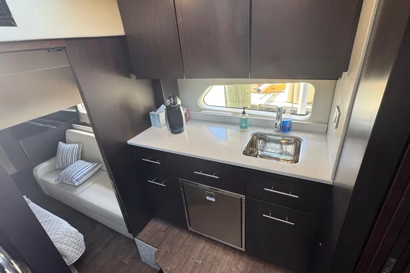 Slide: The Image of Luxurious 2019 Regal 42 Fly yacht interior kitchen with modern amenities. - 37