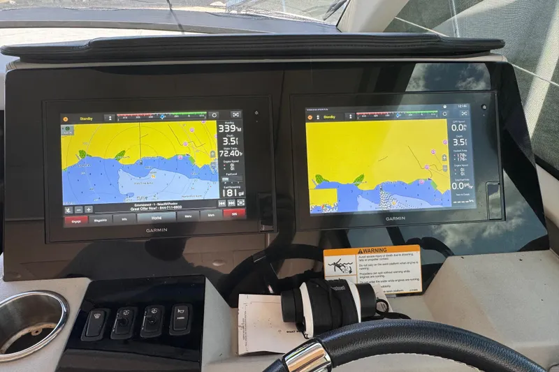 Slide: The Image of Garmin navigation screens on 2019 Regal 42 Fly yacht dashboard. - 47