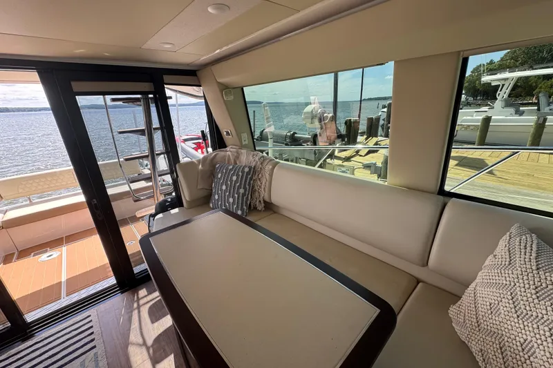 Slide: The Image of Luxurious interior of 2019 Regal 42 Fly yacht with waterfront view. - 53