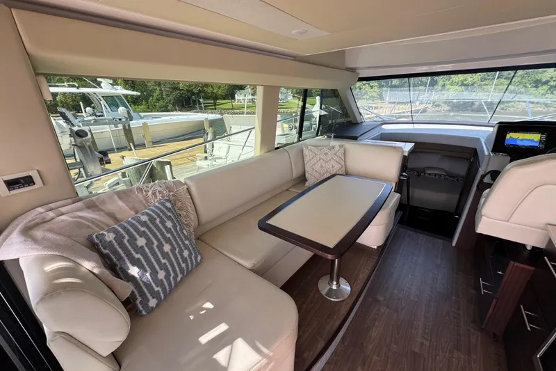 Slide: The Image of Luxurious interior of 2019 Regal 42 Fly yacht with plush seating and modern design. - 58