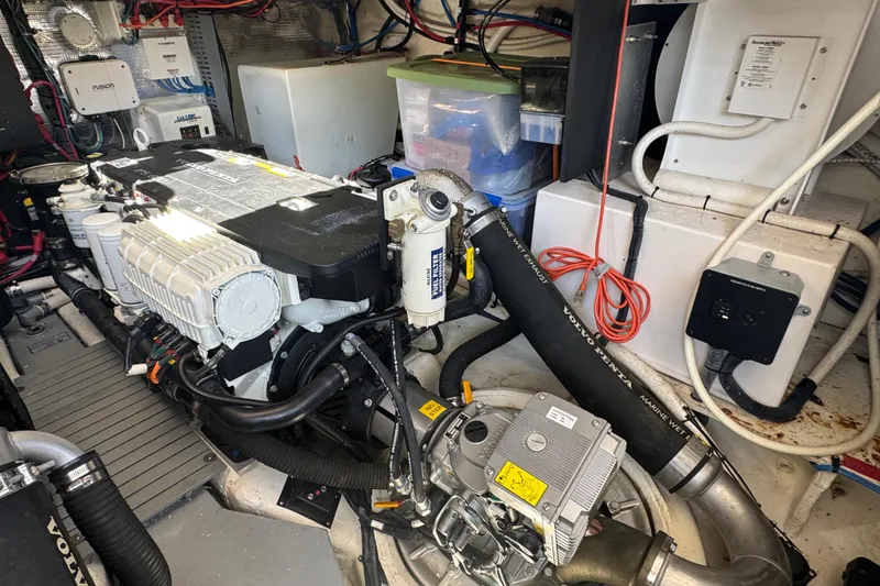 Slide: The Image of Engine room of a 2019 Regal 42 Fly yacht, featuring Volvo Penta components. - 67