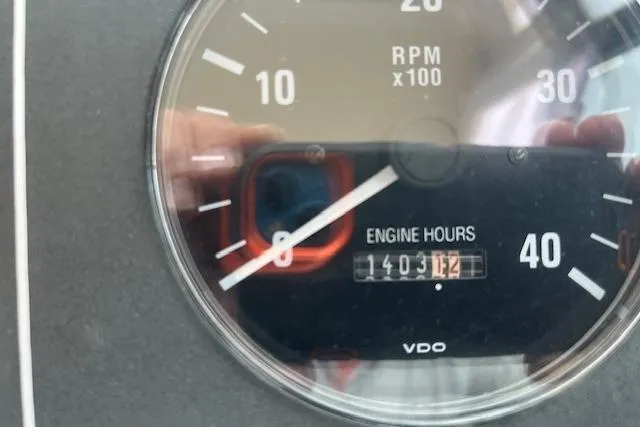 Slide: The Image of Close-up of Tiara Yachts 3500 Open 1998 tachometer showing 1403 engine hours. - 25