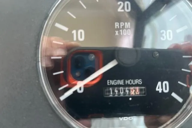 Slide: The Image of Close-up of Tiara Yachts 3500 Open 1998 tachometer showing 1404.2 engine hours. - 26