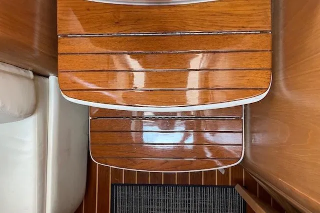 Slide: The Image of Polished wooden steps inside a 1998 Tiara Yachts 3500 Open. - 29