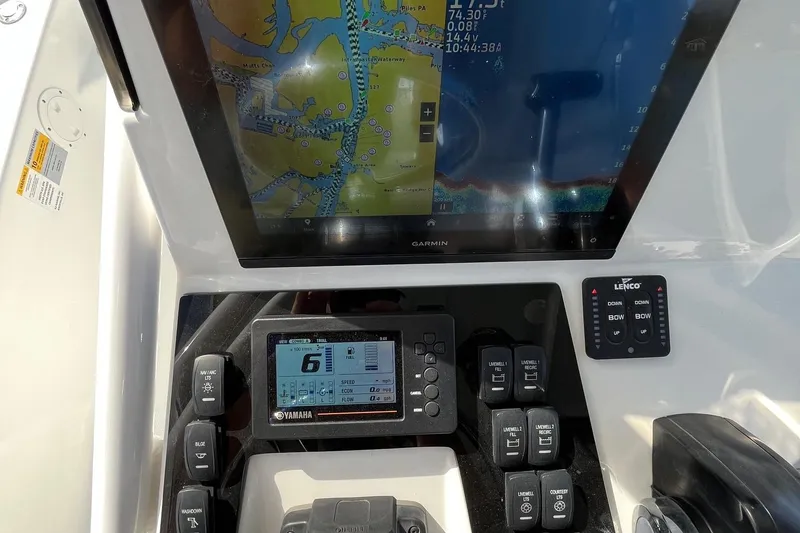 Slide: The Image of Boat dashboard with Garmin navigation and Yamaha controls, BlackJack 224, 2022 model. - 8
