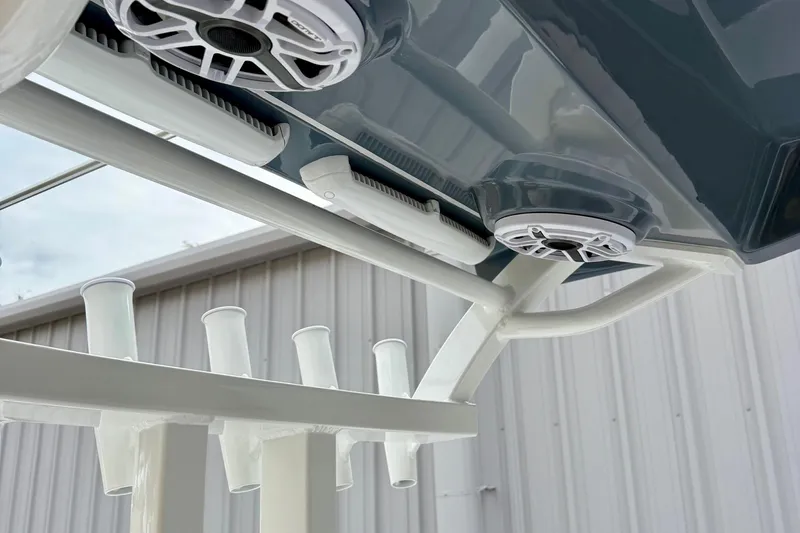 Slide: The Image of Luxurious seating on 2026 Tidewater 302 CC Adventure boat, featuring elegant white upholstery. - 23