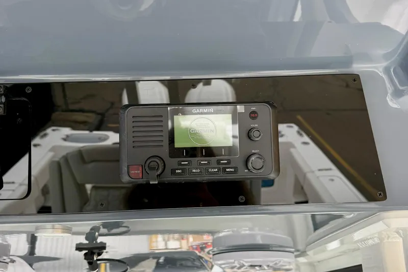 Slide: The Image of Tidewater 302 CC Adventure 2026 boat detail with logo and shower button. - 26