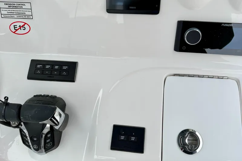 Slide: The Image of Luxurious seating on 2026 Tidewater 302 CC Adventure boat, featuring elegant white upholstery. - 28